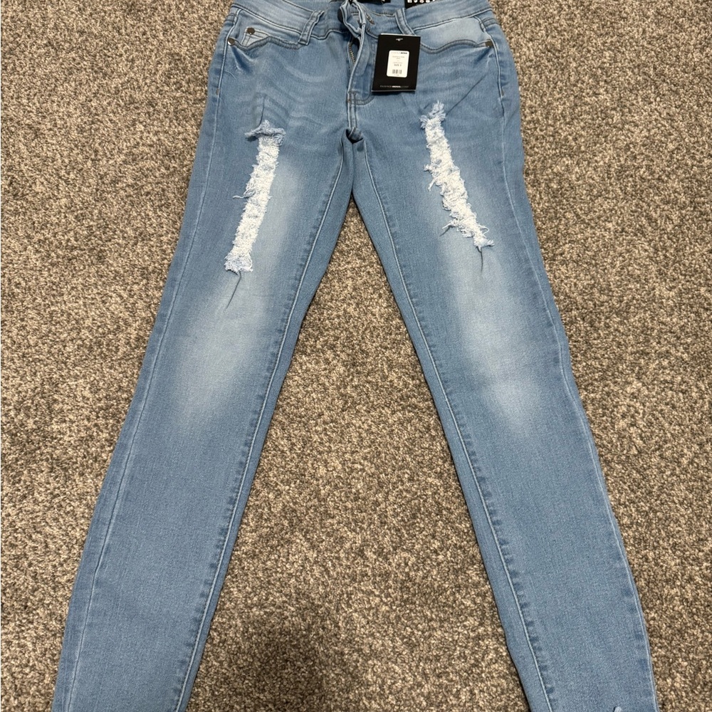 Fashion Nova Light Blue Ripped Skinny Jeans